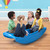 Four children rocking and laughing on the Simplay3 Rocking Bridge in the playroom