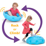 Kids rocking and climbing on the Simplay3 Rock Around Wobble Disk for children 