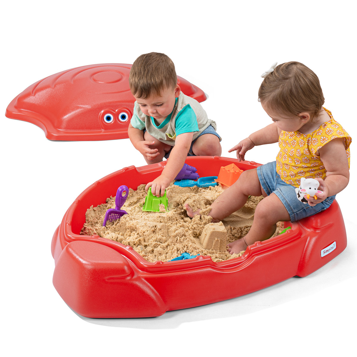 Toddler boy and girl playing in red Simplay3 Coastal Crab Sandbox
