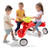 Simplay3 Boomerang Trike with two girls seated and one boy getting on